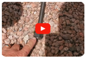 Anchoring system with anchor bolts, J-bolts, and strap anchors for foundation repair
