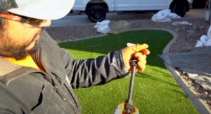 Contractor comparing anchor bolt types for a foundation repair project