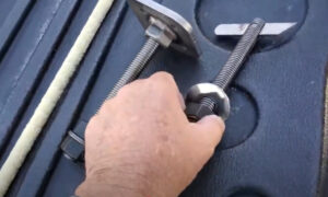 Standard knife anchor bolt connecting wood framing to concrete foundation
