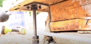 Different anchor bolt types arranged for structural repair planning